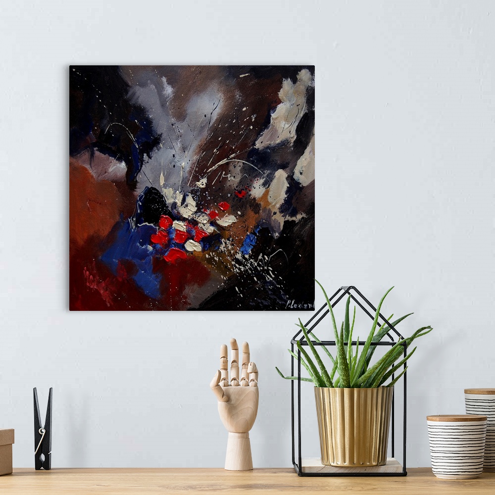 A bohemian room featuring Abstract painting of colors of brown, black and blue with hints of red in textured brush strokes ...