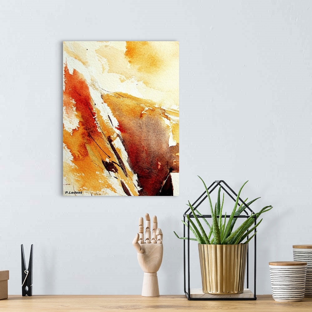 A bohemian room featuring Vertical abstract watercolor painting of shades of yellow, brown and orange.