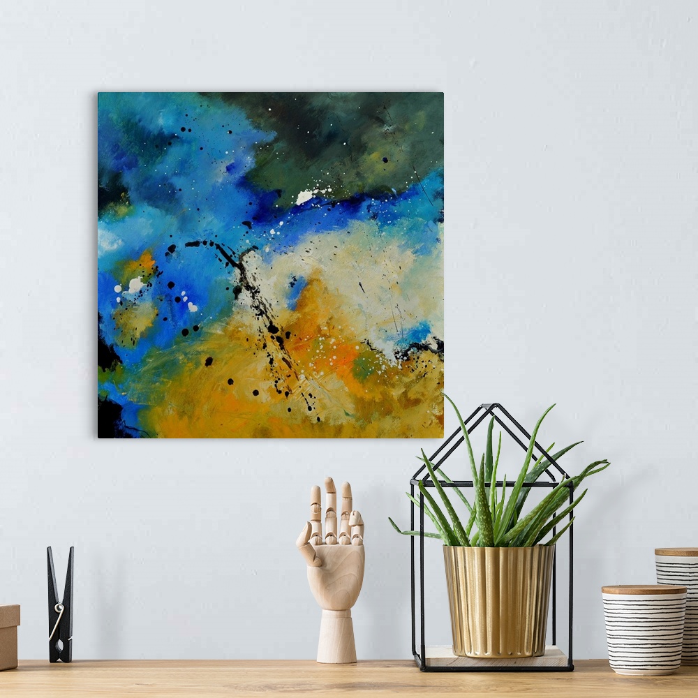 A bohemian room featuring Square abstract painting in shades of yellow, blue, green and white mixed in with black contrasti...