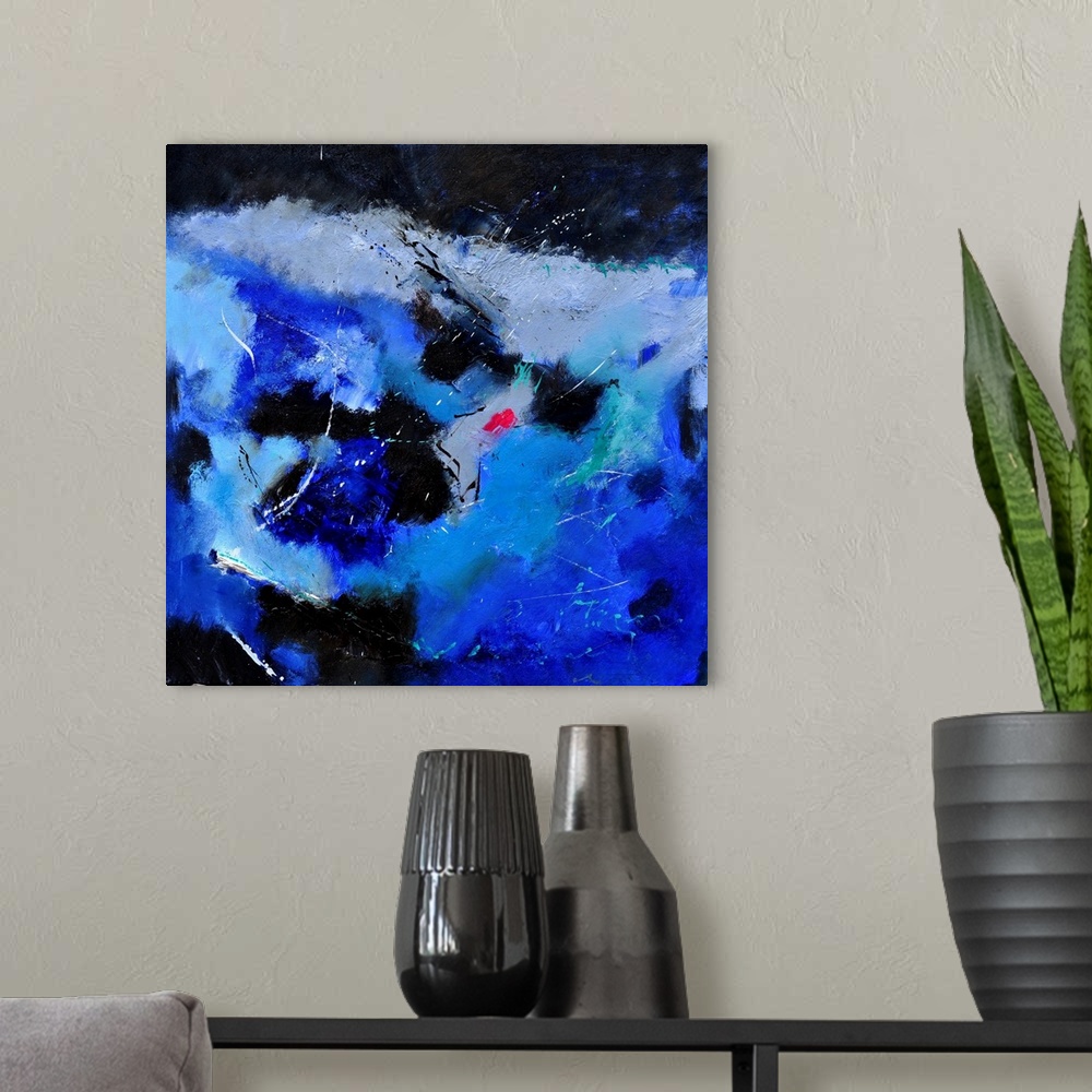 A modern room featuring A square abstract painting of colors of black, white and blue in bold brush strokes and splattere...