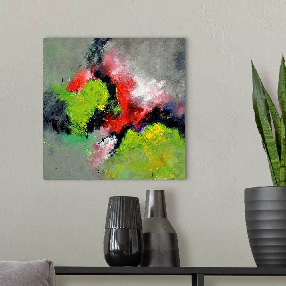 A modern room featuring A square abstract painting with deep textured colors of green and red.