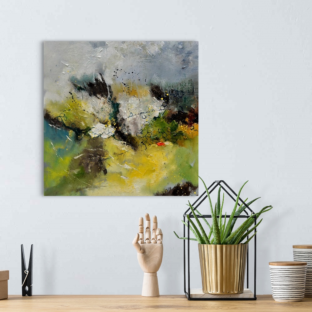 A bohemian room featuring A square abstract painting in textured shades of gray, brown, green and yellow with splatters of ...