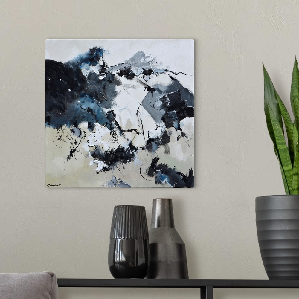 A modern room featuring Contemporary abstract painting in neutral gray hues.