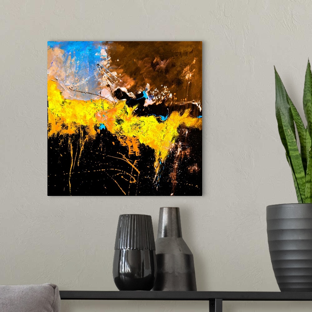 A modern room featuring A square abstract painting in textured shades of orange, blue, brown and yellow with splatters of...