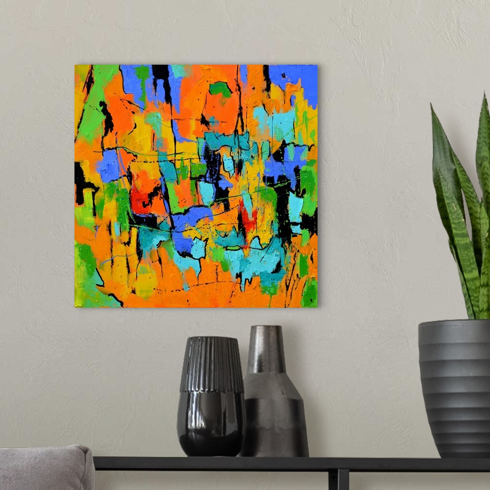 A modern room featuring A square abstract painting in textured shades of orange, blue, green and yellow with splatters of...