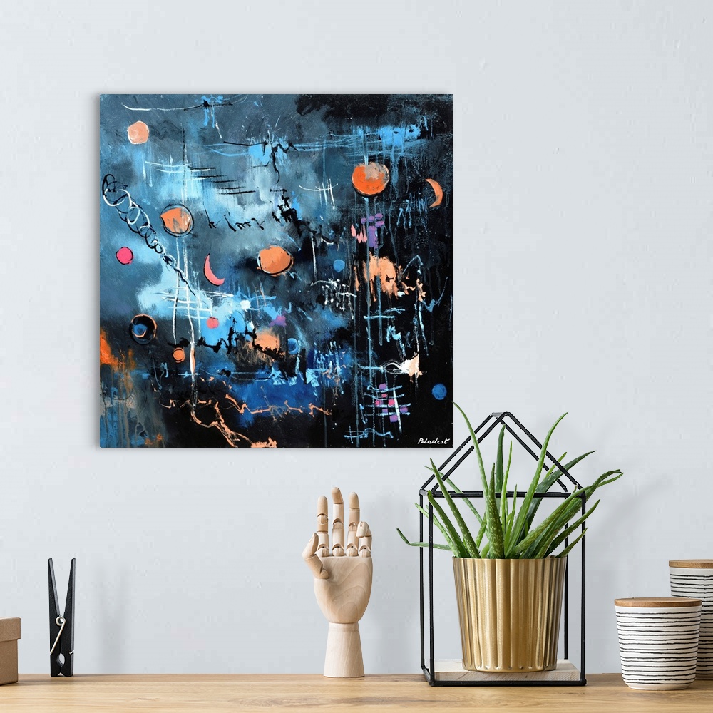 A bohemian room featuring Contemporary abstract painting in dark blues and blacks.
