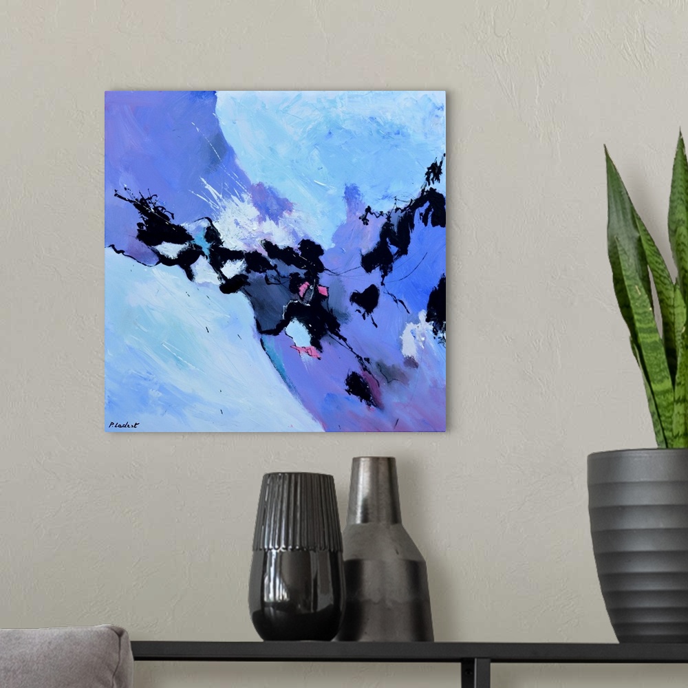 A modern room featuring Contemporary abstract painting in bright purple and blue hues.