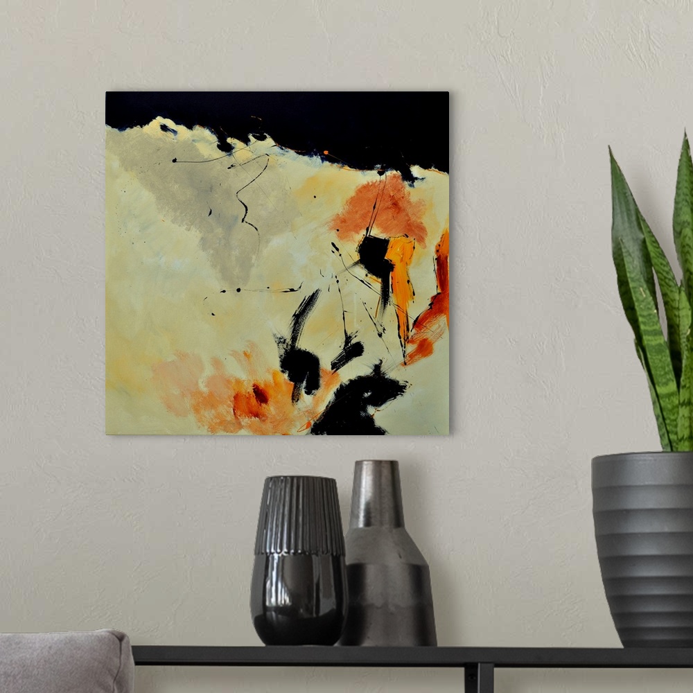 A modern room featuring A square abstract painting with muted colors of orange and yellow.