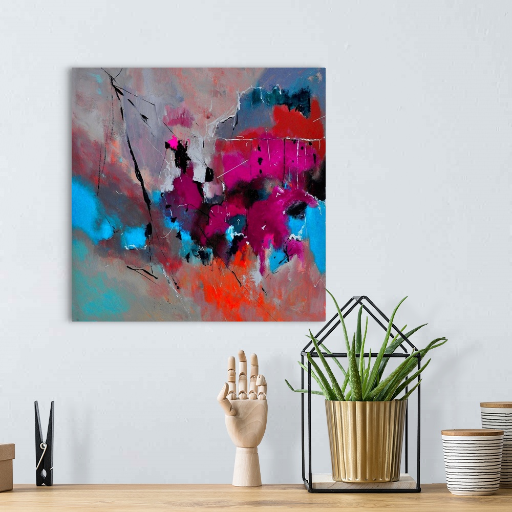 A bohemian room featuring Abstract painting with vibrant hues in shades of orange, blue, pink, red and gray mixed in with b...