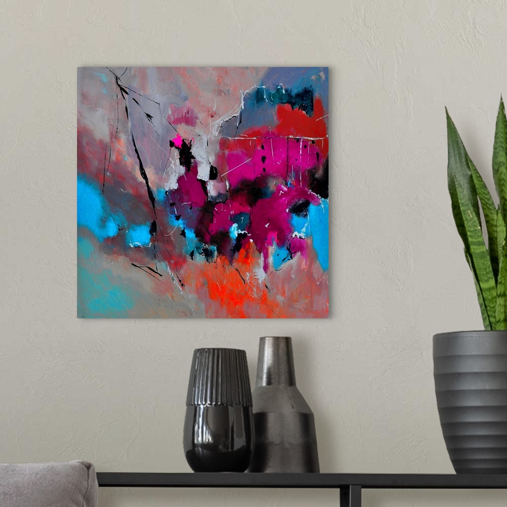 A modern room featuring Abstract painting with vibrant hues in shades of orange, blue, pink, red and gray mixed in with b...