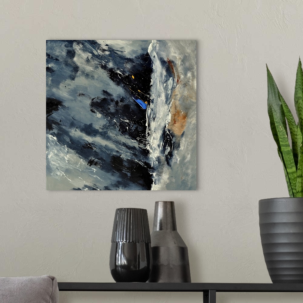 A modern room featuring A square abstract painting of colors of gray, white and blue in bold brush strokes and splattered...