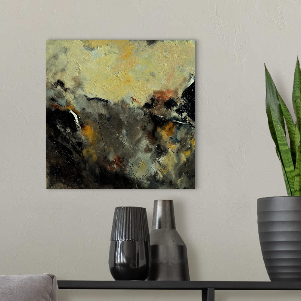 A modern room featuring A square abstract painting in dark shades of black, brown, white and yellow with splatters of pai...