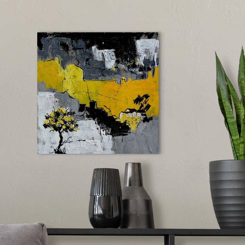 A modern room featuring A square abstract painting in textured shades of black, gray and yellow with splatters of paint o...
