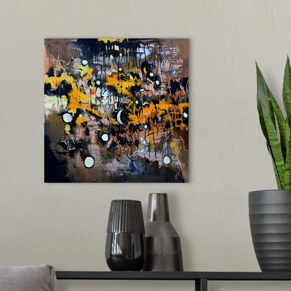 A modern room featuring A square abstract painting in dark shades of black, brown, white and orange with splatters of pai...