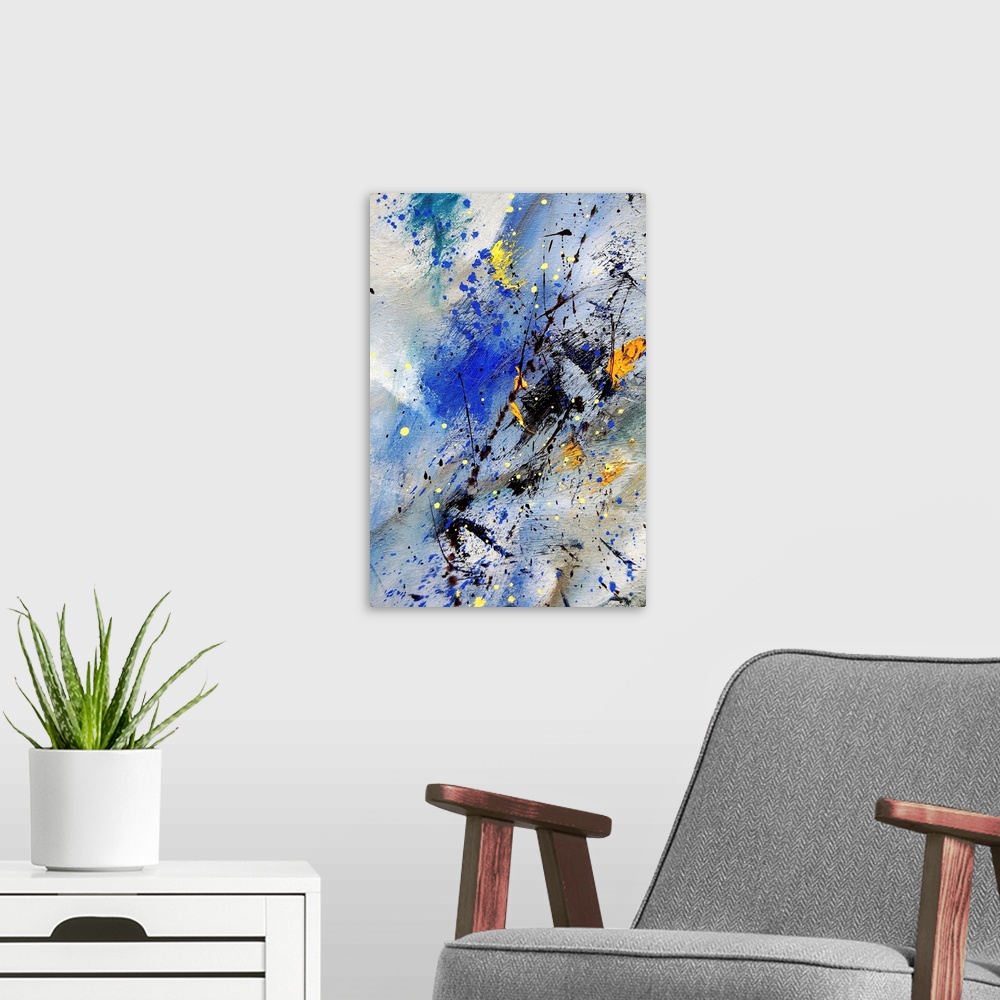 A modern room featuring Vertical abstract painting in shades of orange, yellow, blue, and black mixed in with speckled pa...
