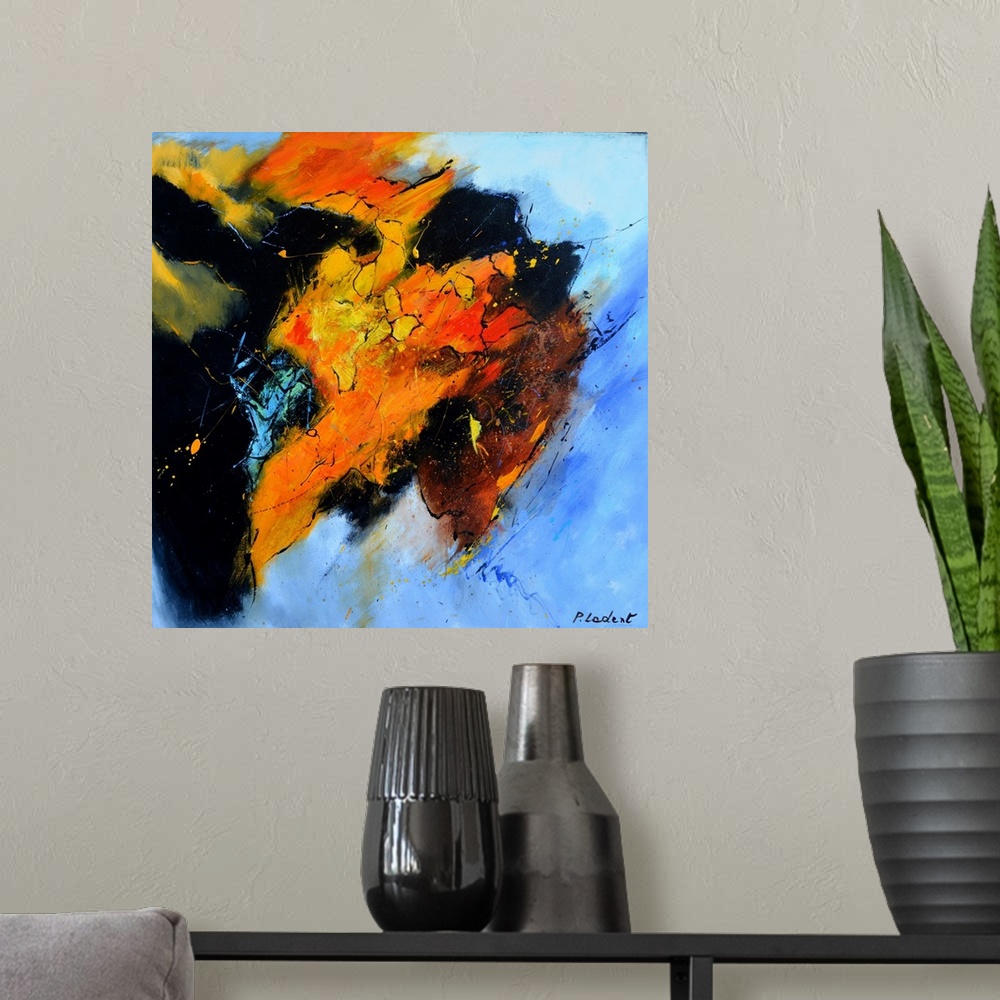 A modern room featuring Abstract painting representing a bull's head from the side in vibrant orange, red, and yellow hue...