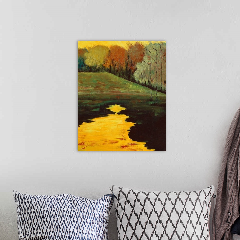 A bohemian room featuring A contemporary landscape of a field and trees next to a lake in warm autumn colors.