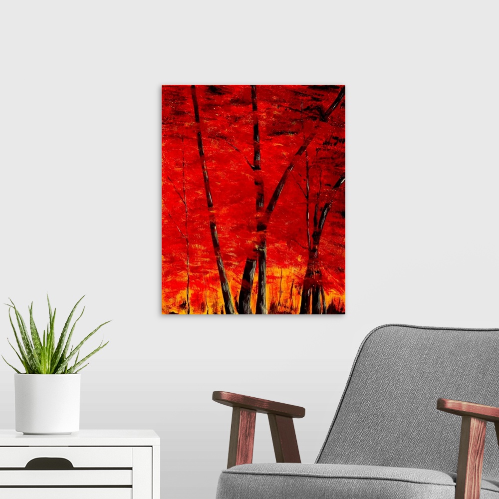 A modern room featuring A intense contemporary painting of trees in a forest, with leaves of red and yellow.