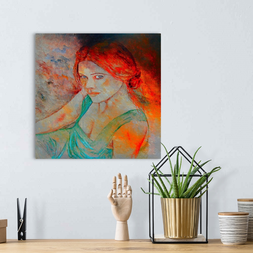 A bohemian room featuring A vibrant contemporary painting of a female with red hair.