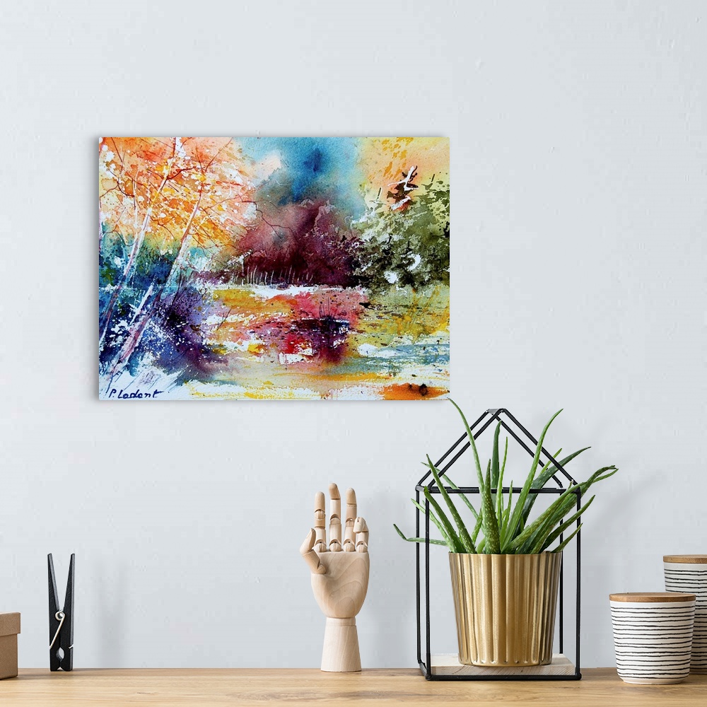 A bohemian room featuring A horizontal abstract landscape of a forest with watercolors of orange, red and blue.