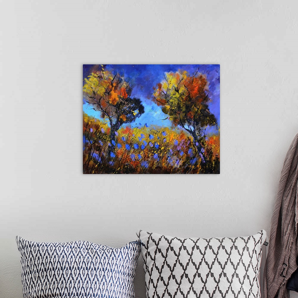 A bohemian room featuring Contemporary abstract landscape painting in vibrant hues.