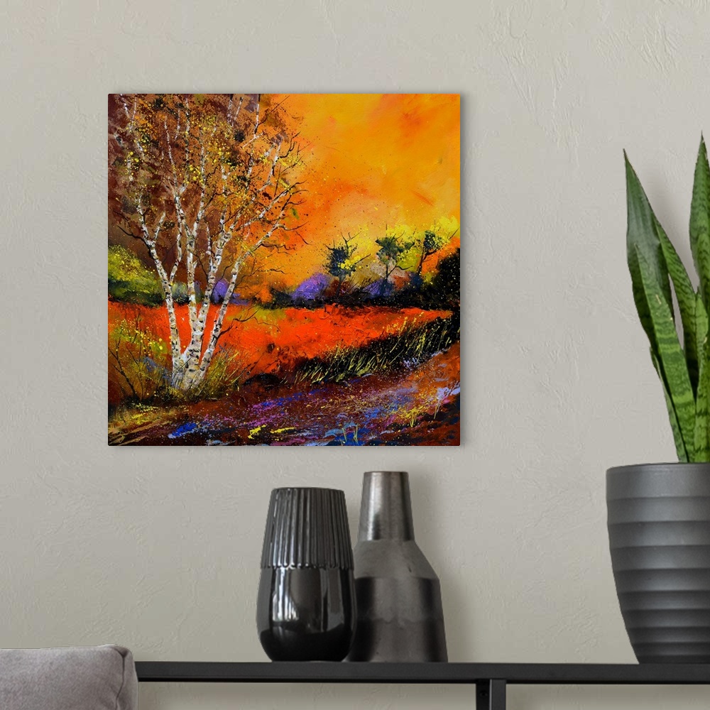 A modern room featuring Square painting of an Autumn landscape with orange and yellow flowers in the foreground and a bri...