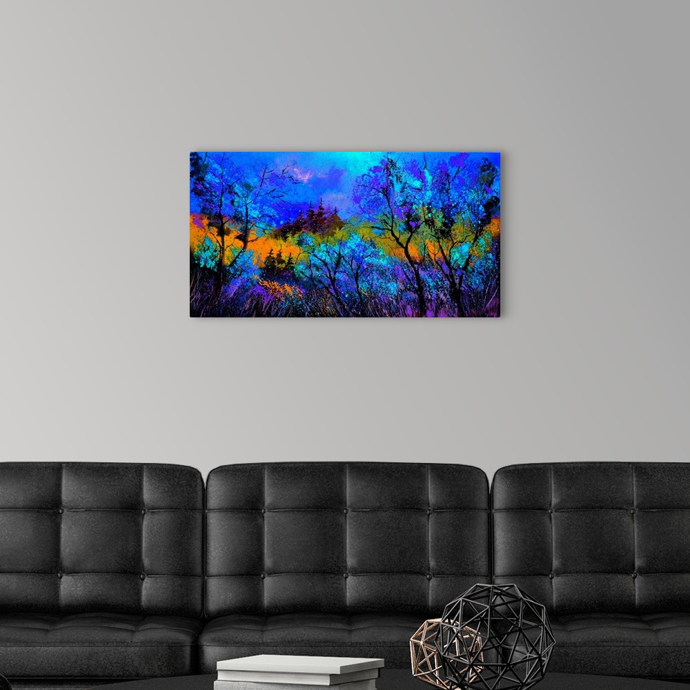 A modern room featuring Horizontal painting landscape of blue trees in the foreground and a bright warm sky in the backgr...