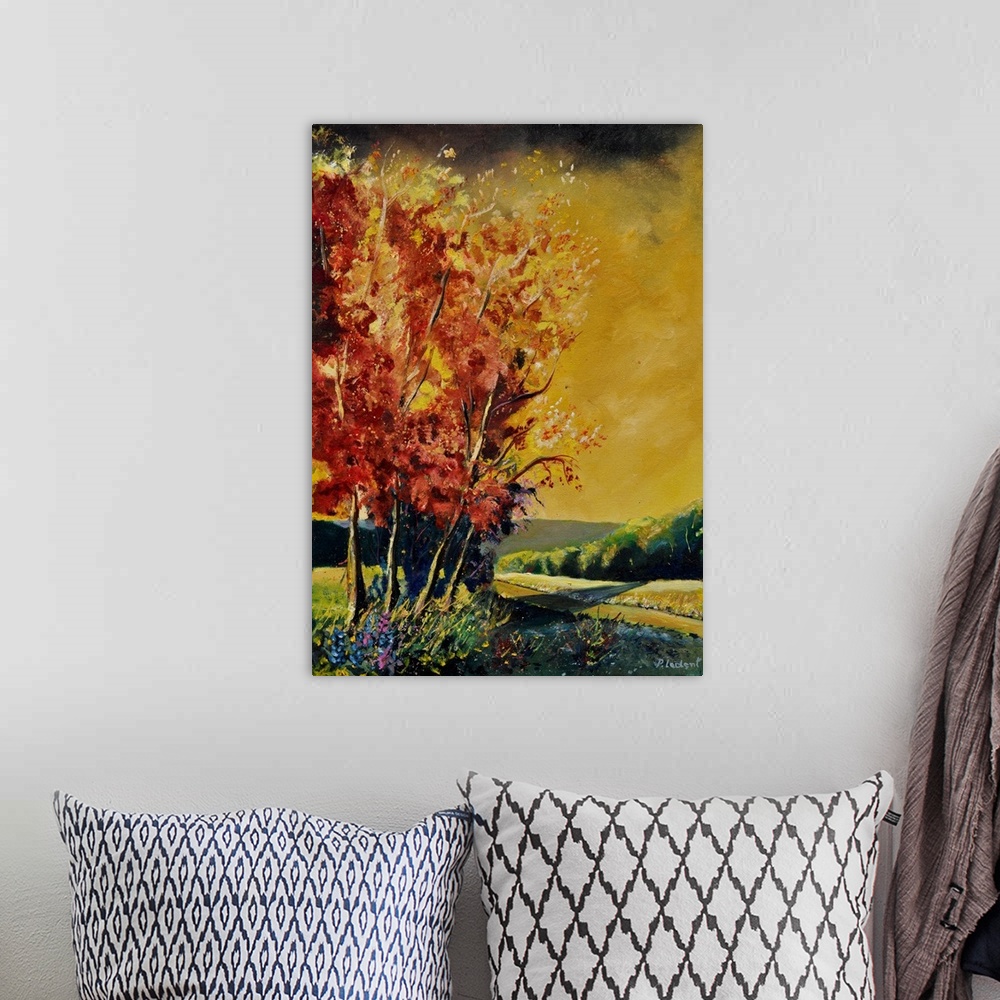 A bohemian room featuring Vertical painting of lively orange leaved  trees on an autumn day.