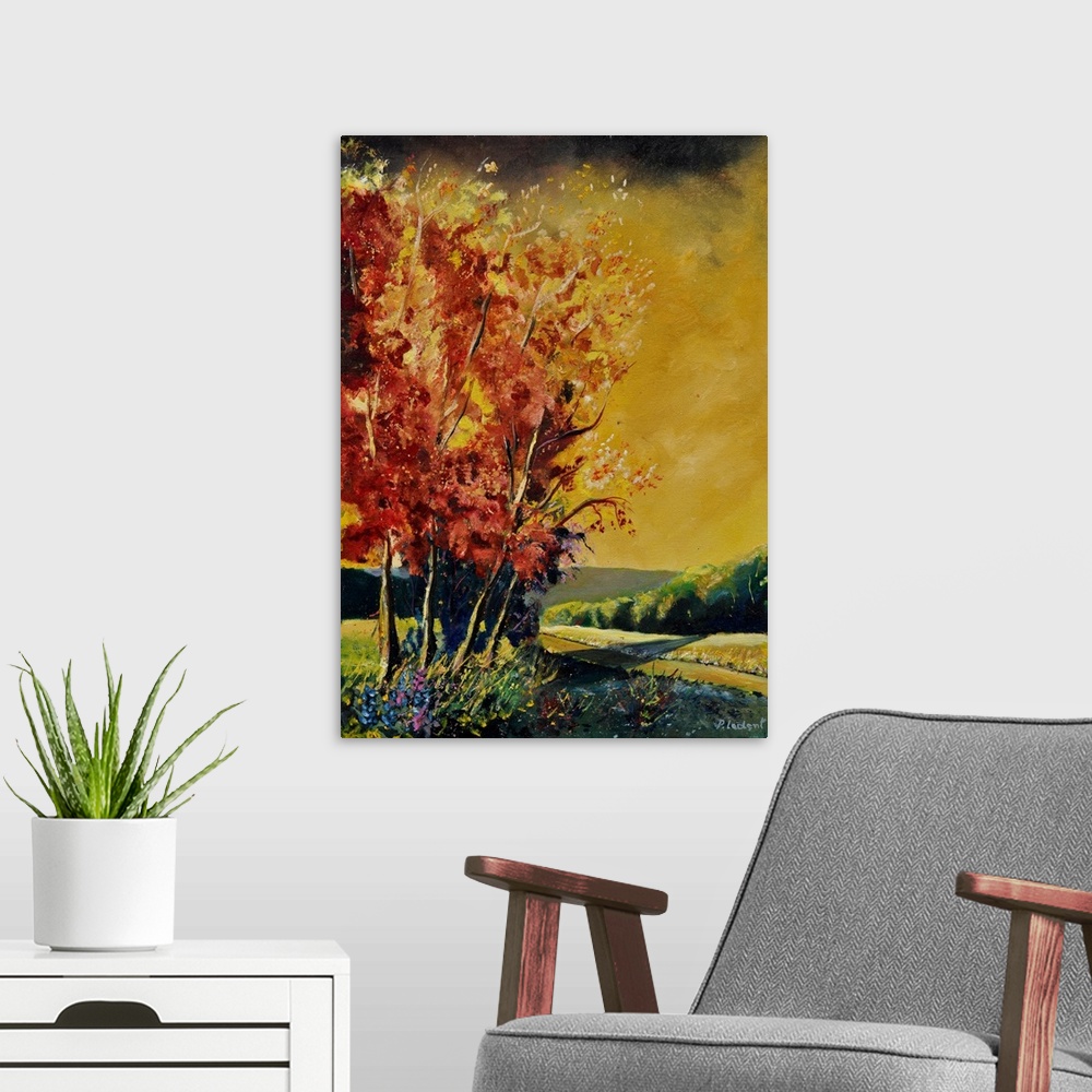 A modern room featuring Vertical painting of lively orange leaved  trees on an autumn day.