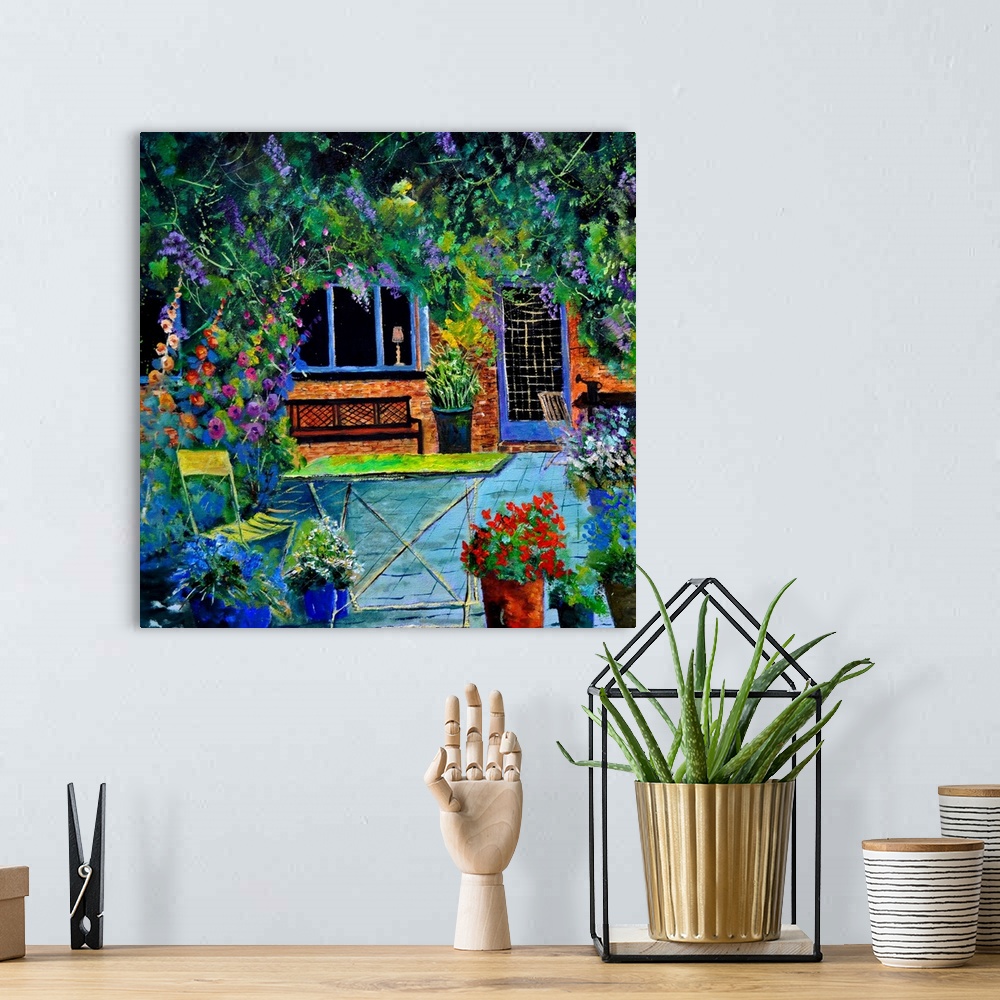 A bohemian room featuring Square painting of a patio surrounded by blooming flowers in a garden.