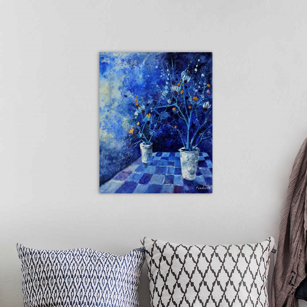A bohemian room featuring Contemporary abstract painting of two vases of flowers in monochromatic blue.