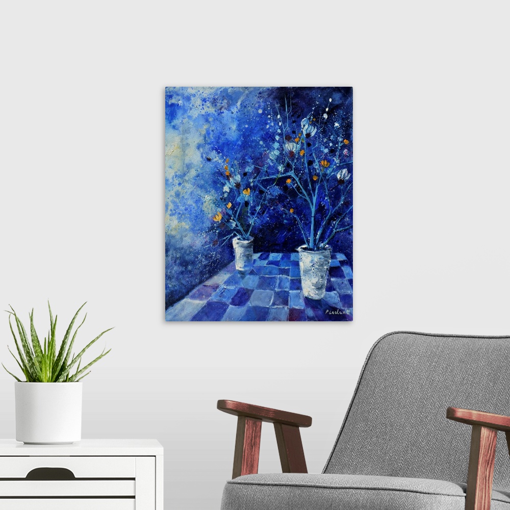 A modern room featuring Contemporary abstract painting of two vases of flowers in monochromatic blue.