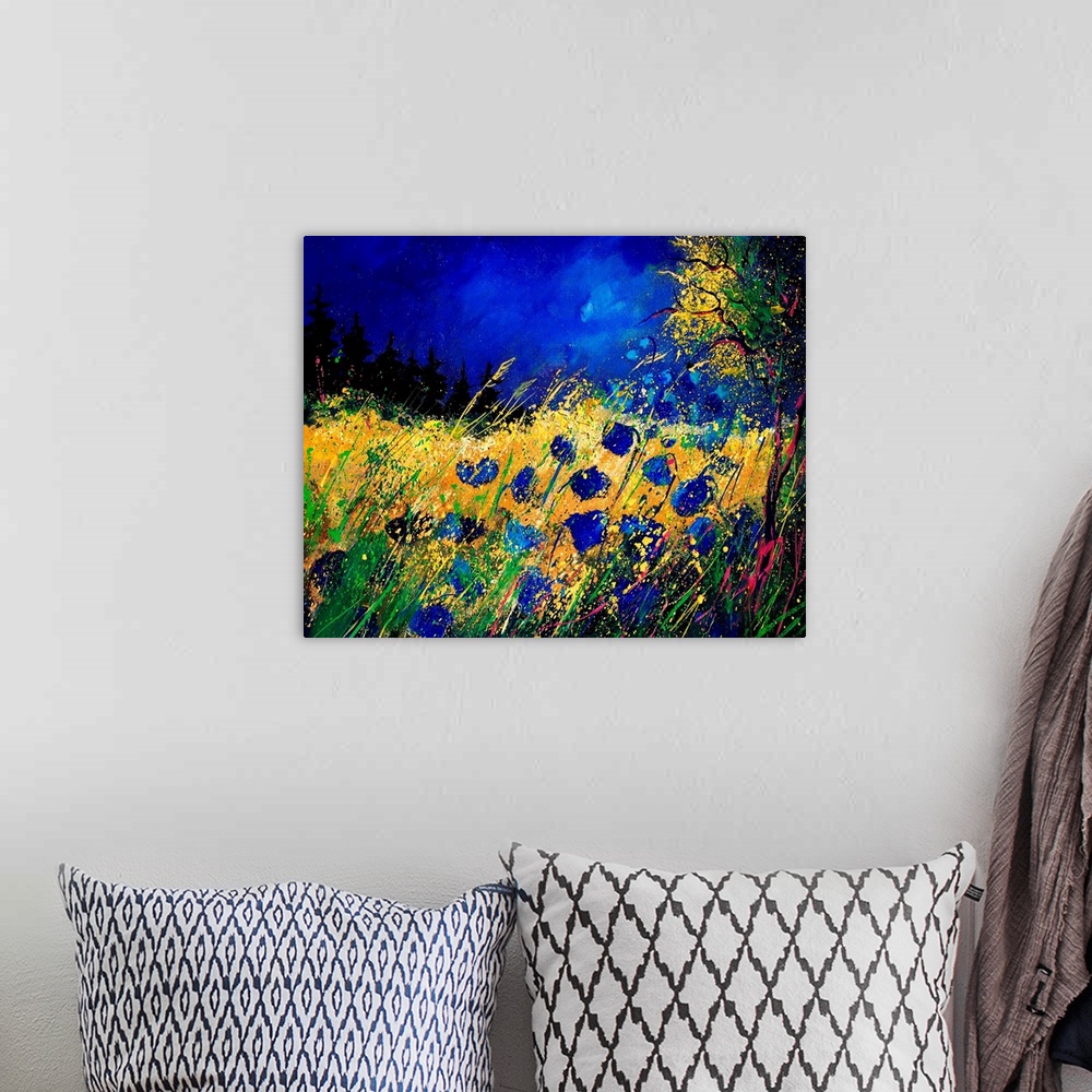 A bohemian room featuring Contemporary painting of a field of blue cornflowers along a tree with a vibrant blue sky.