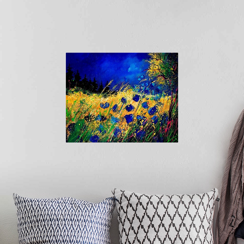 A bohemian room featuring Contemporary painting of a field of blue cornflowers along a tree with a vibrant blue sky.