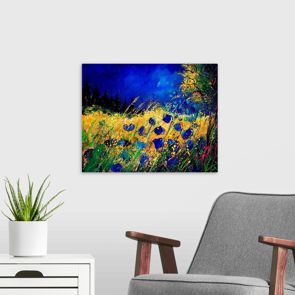 A modern room featuring Contemporary painting of a field of blue cornflowers along a tree with a vibrant blue sky.