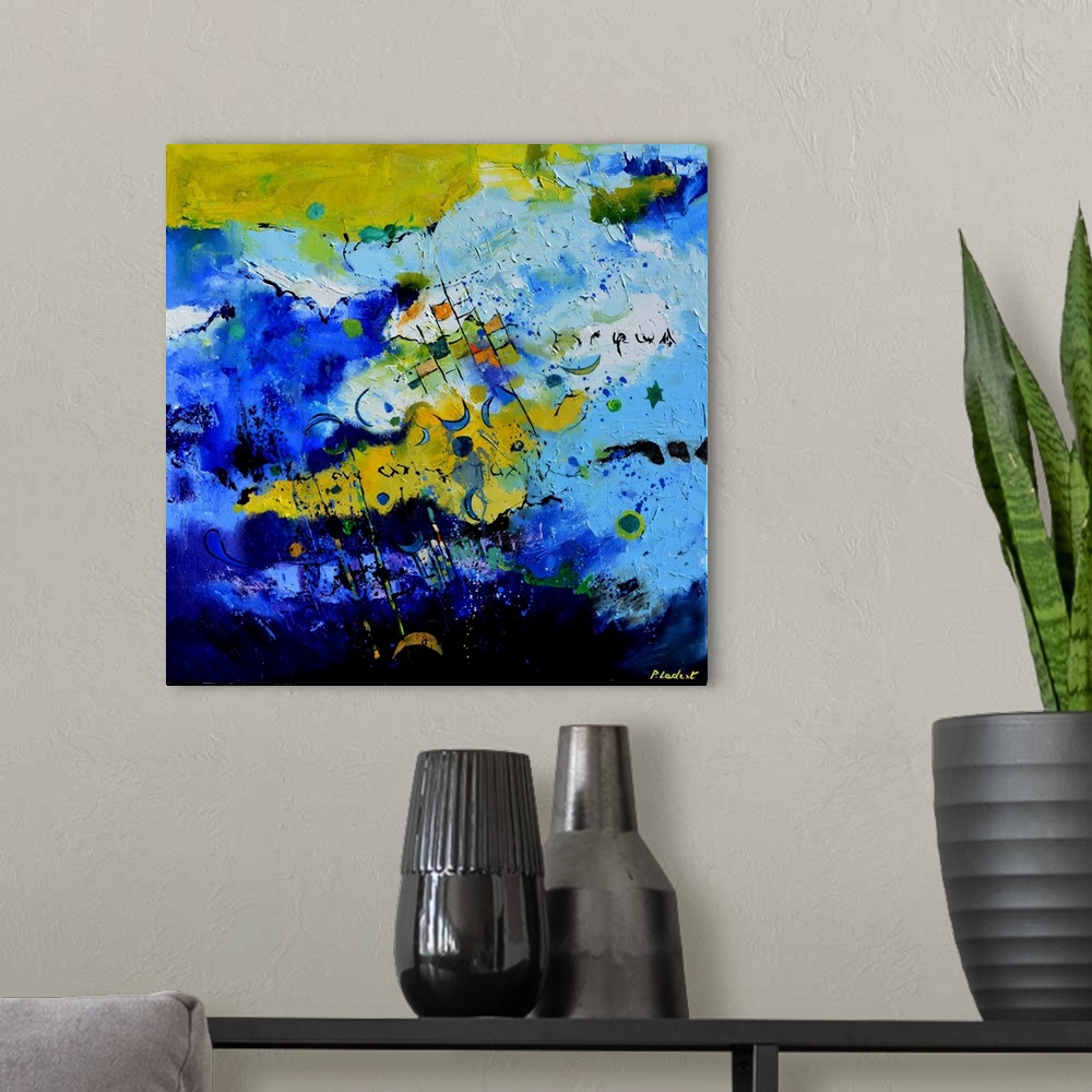 A modern room featuring Square abstract painting made with shades of blue, yellow, green, orange, black, and white with l...