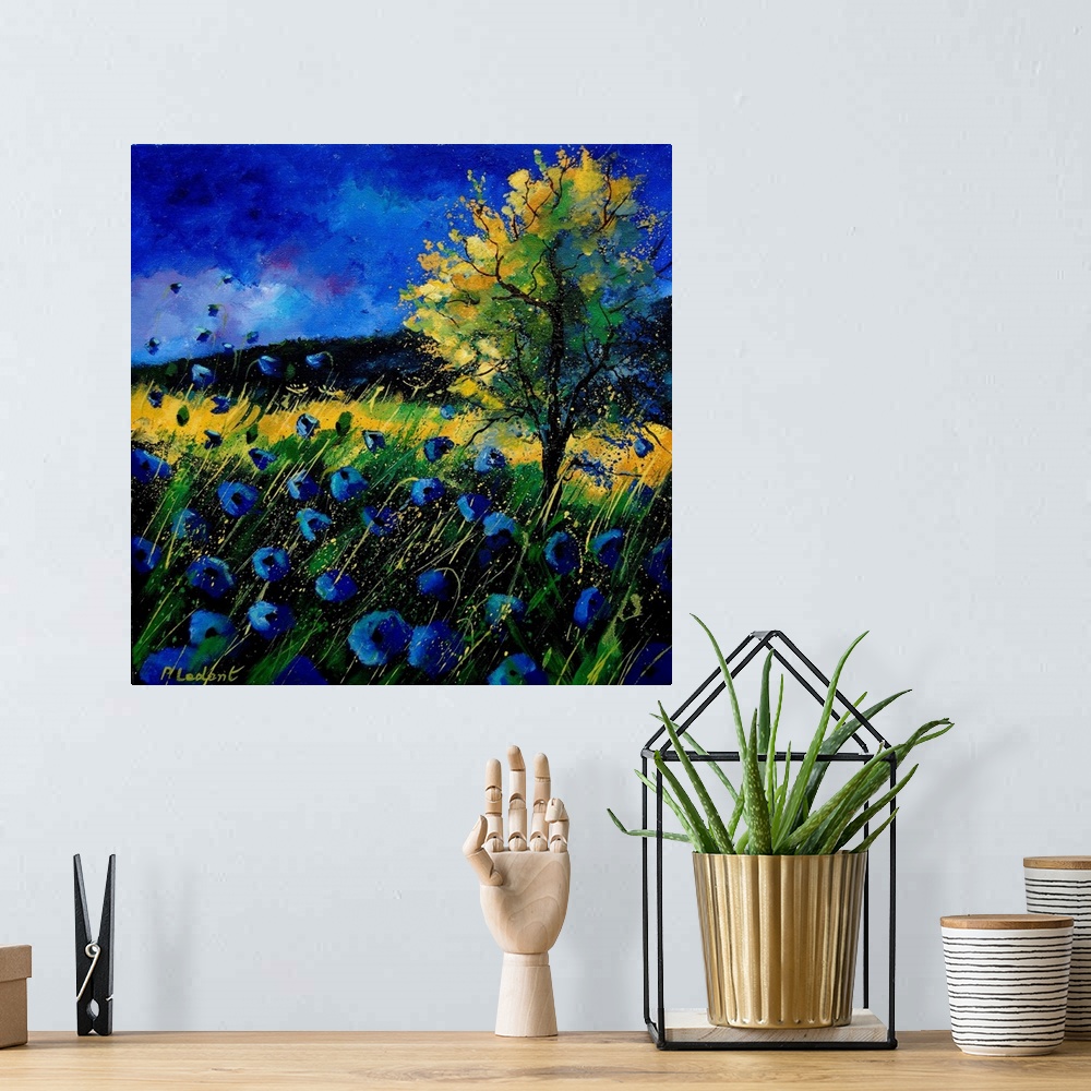 A bohemian room featuring A vertical abstract landscape of a field of blue poppies in colors of green and blue.