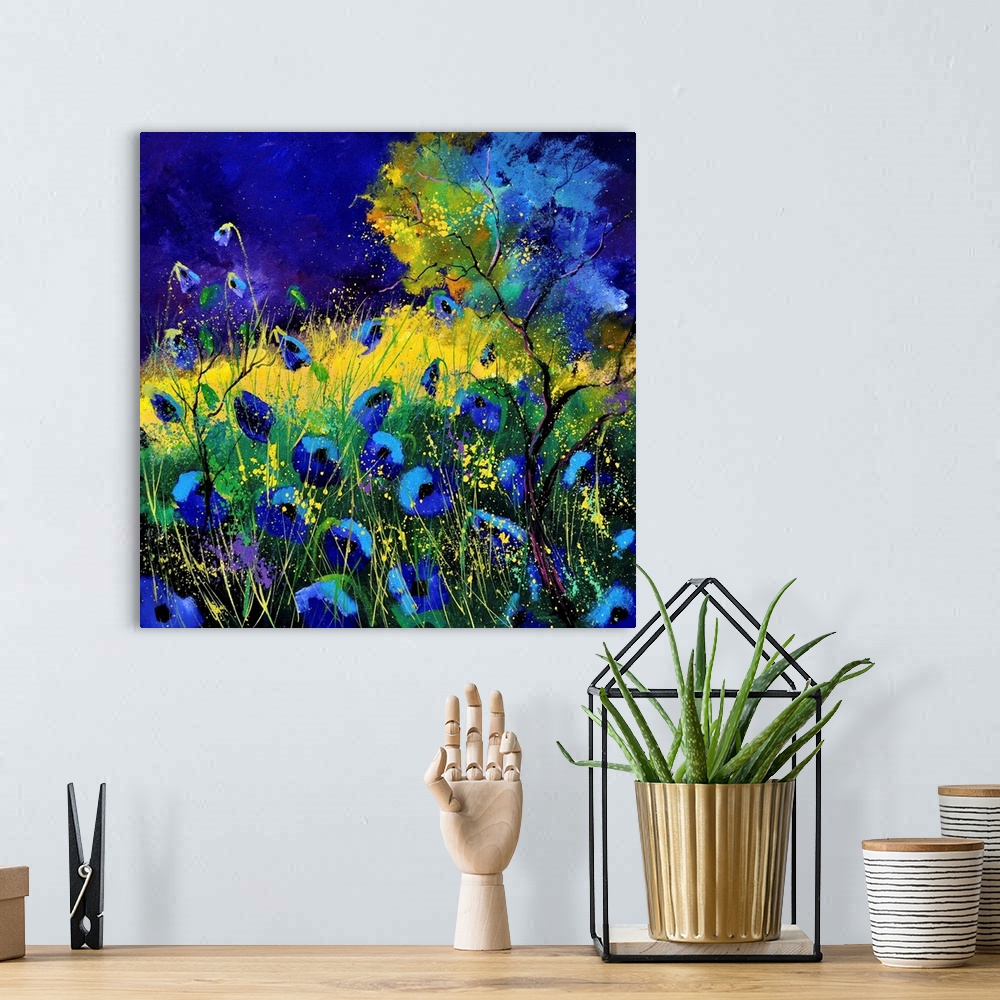 A bohemian room featuring Vibrant painting of blue poppies in a filed with a dark sky.