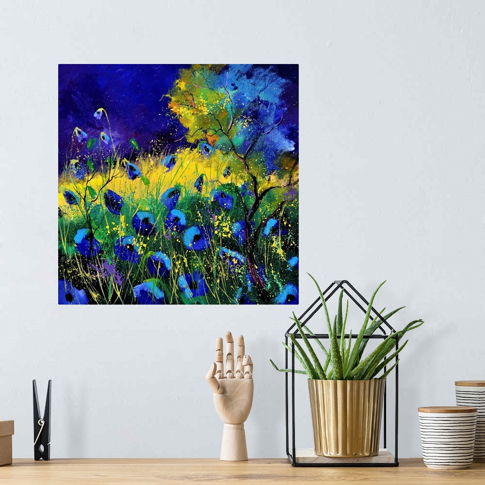 A bohemian room featuring Vibrant painting of blue poppies in a filed with a dark sky.