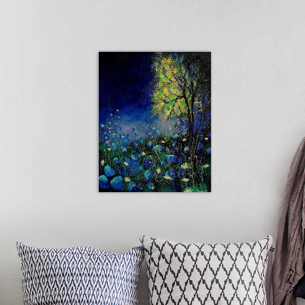 A bohemian room featuring Vertical painting of a field of blue poppies with a tree with splatters of multi-color paint over...
