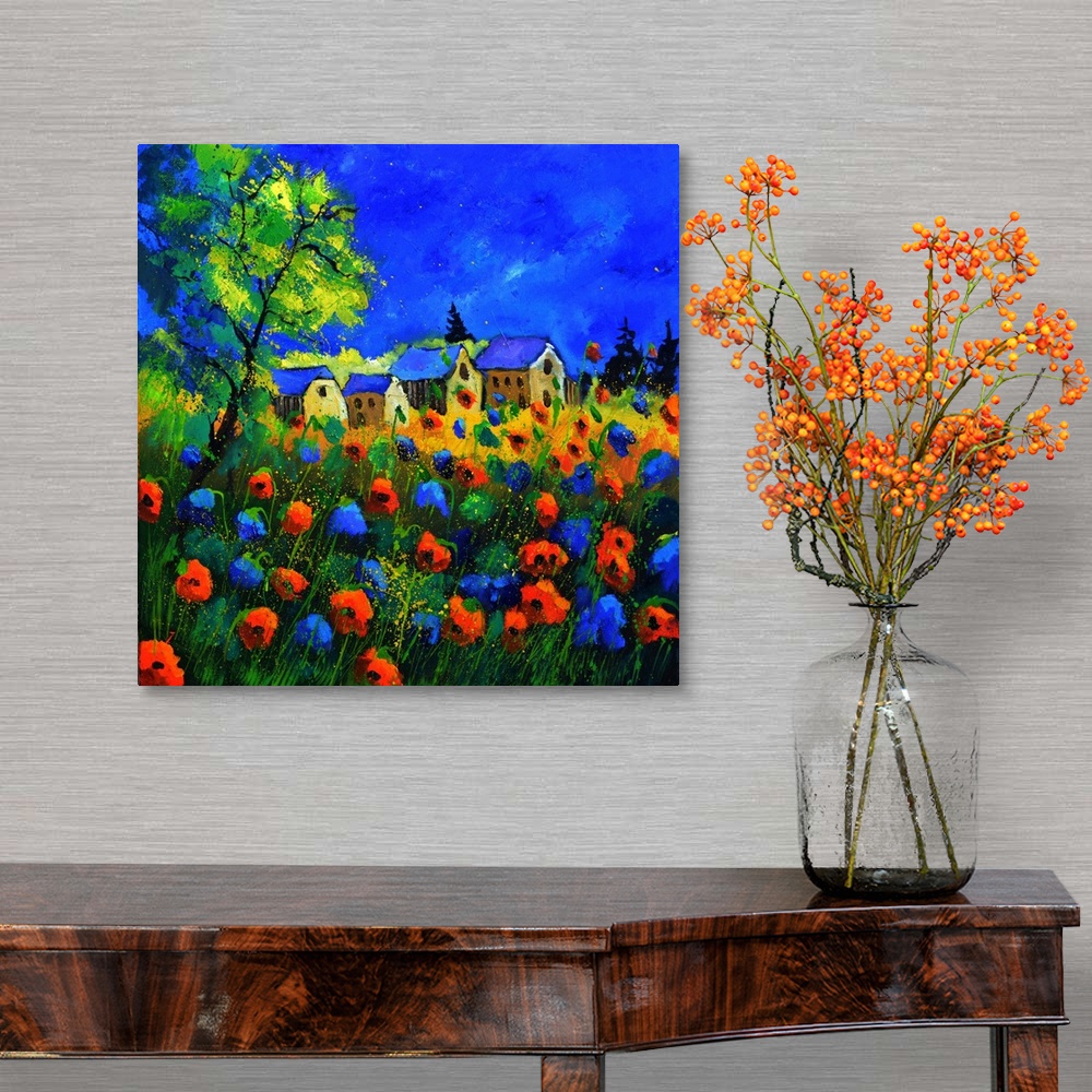 A traditional room featuring Vibrant painting of a bright Summer day with blossoming poppies, a colorful sky, and a village in...
