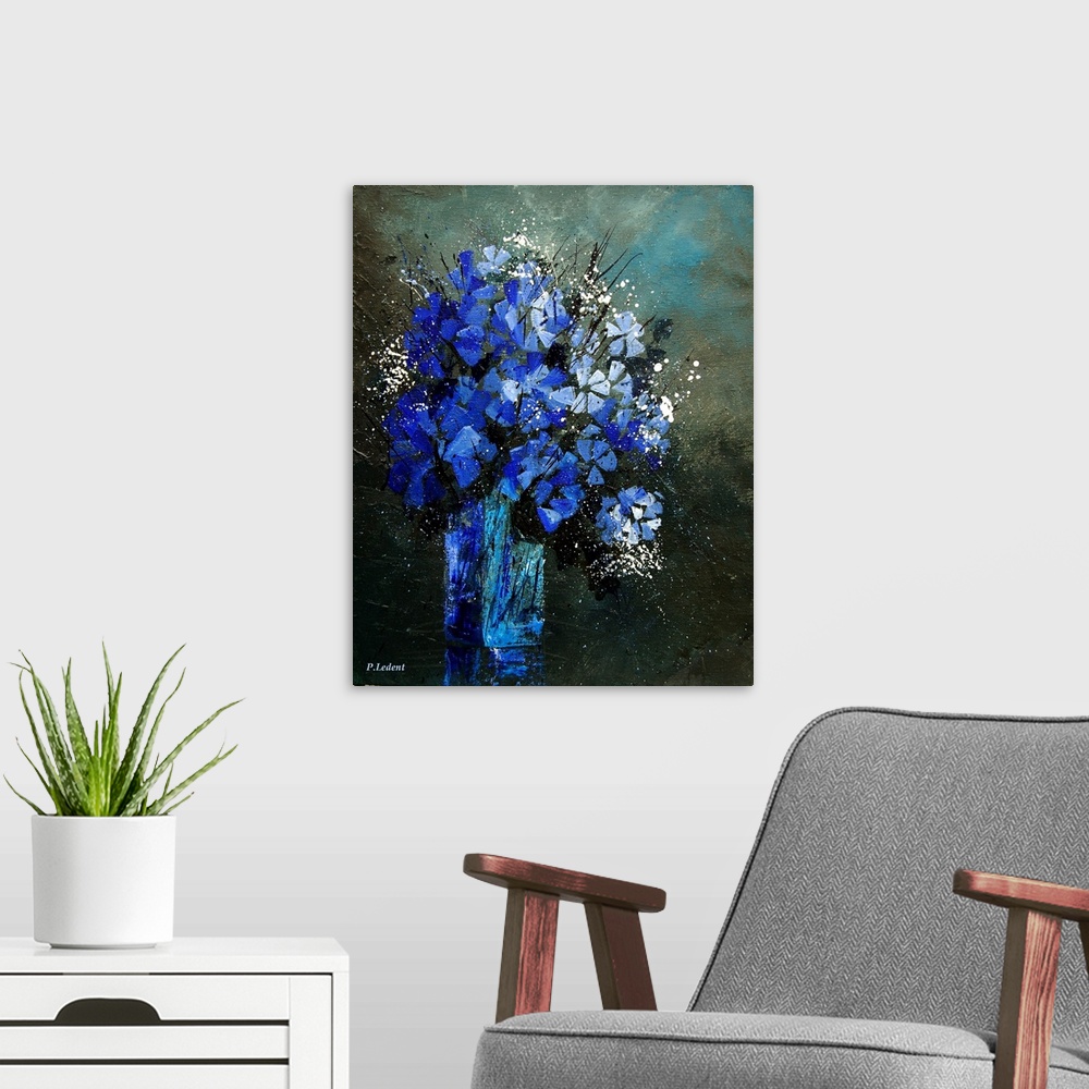 A modern room featuring Contemporary painting of a vase of blue and white flowers against a neutral backdrop.