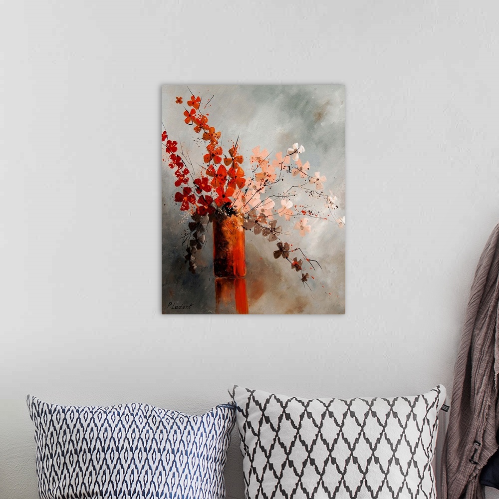 A bohemian room featuring Contemporary painting of a vase of red and peach flowers against a neutral backdrop.