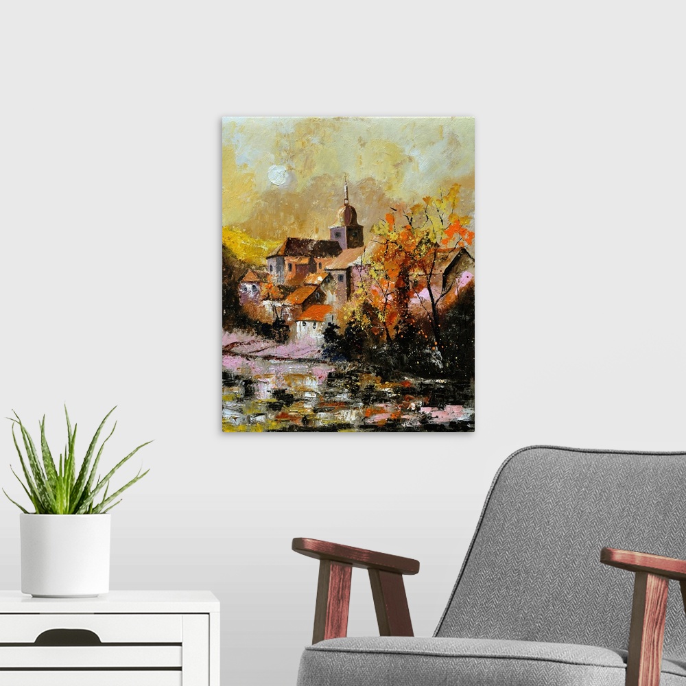 A modern room featuring Vertical painting of an Autumn landscape with flowers in the foreground and a Belgium village in ...