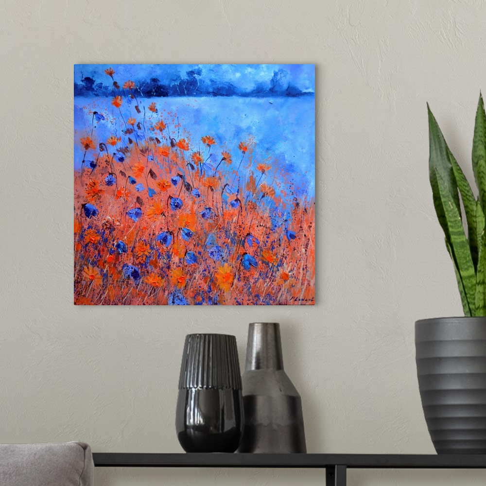 A modern room featuring Contemporary landscape painting of a field of blue and red cornflowers.