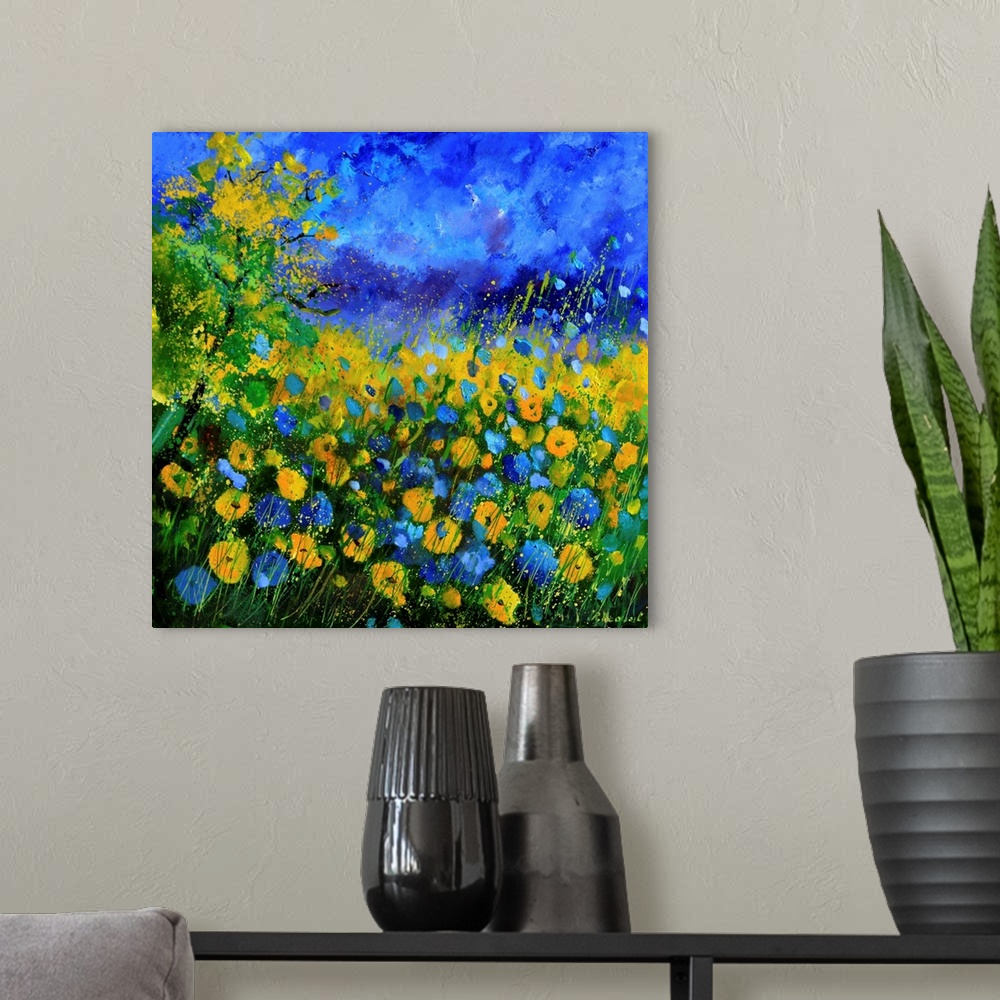 A modern room featuring Contemporary landscape painting of a field of blue and yellow cornflowers.