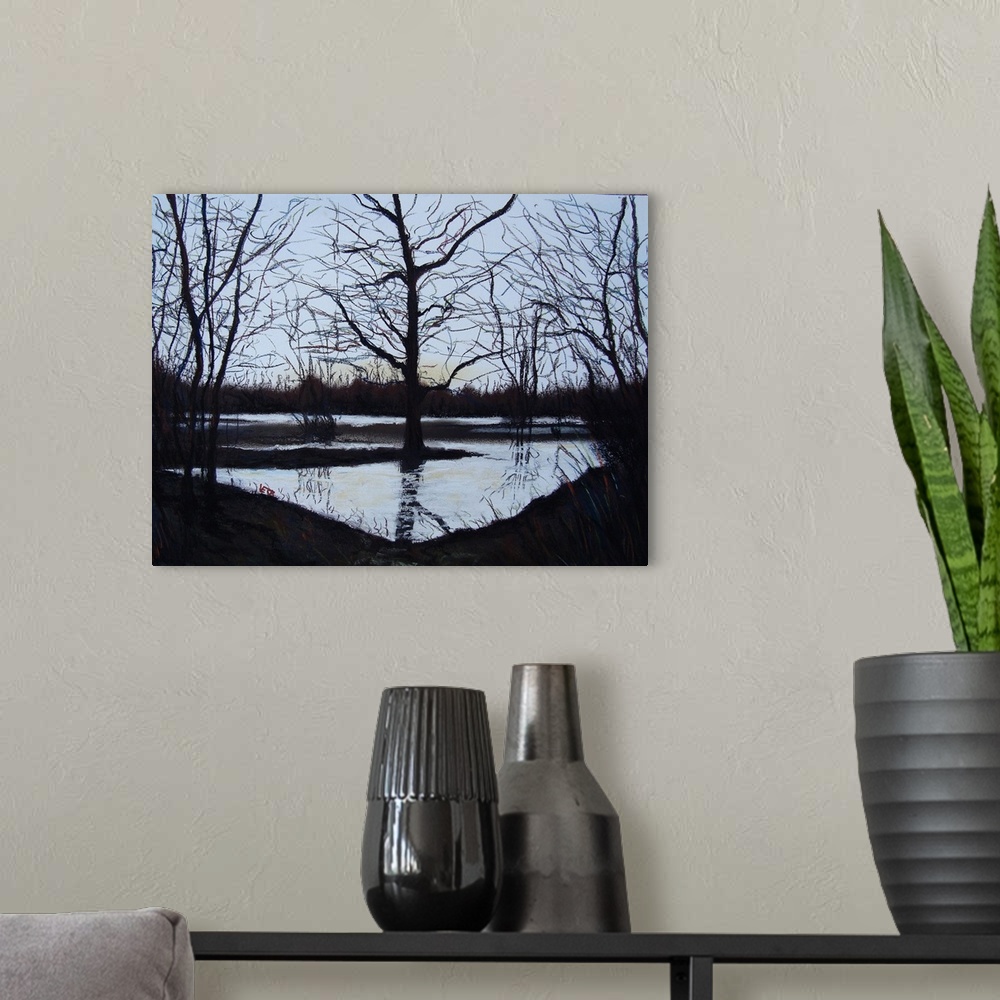 A modern room featuring Horizontal painting of silhouetted trees reflecting on a calm river at night fall.