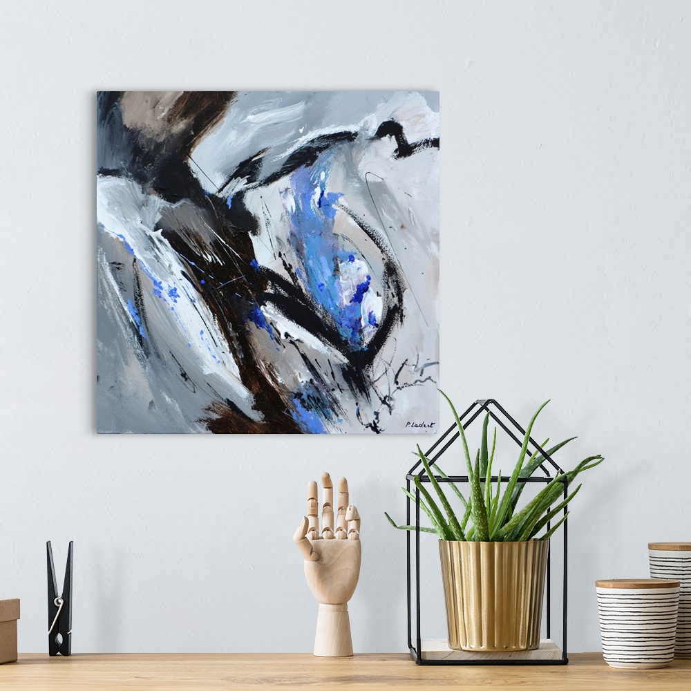 A bohemian room featuring Contemporary abstract painting in gray, black, and blue.