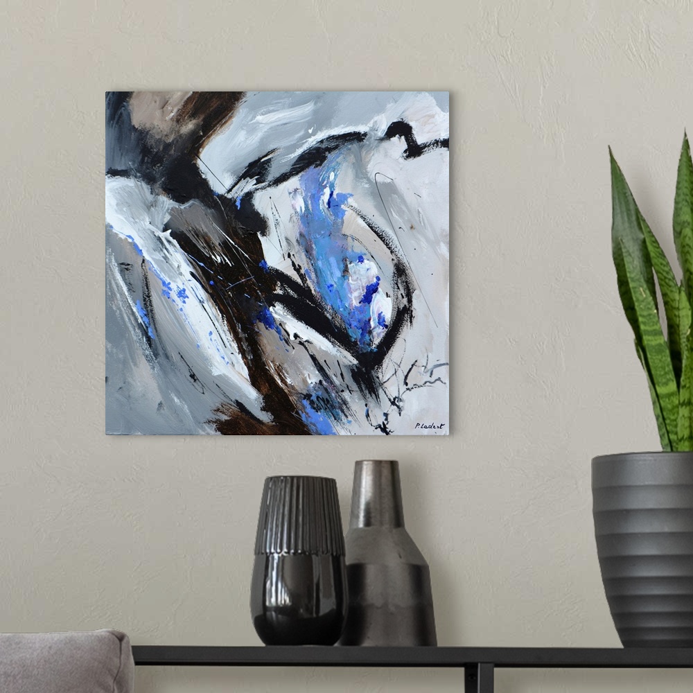 A modern room featuring Contemporary abstract painting in gray, black, and blue.
