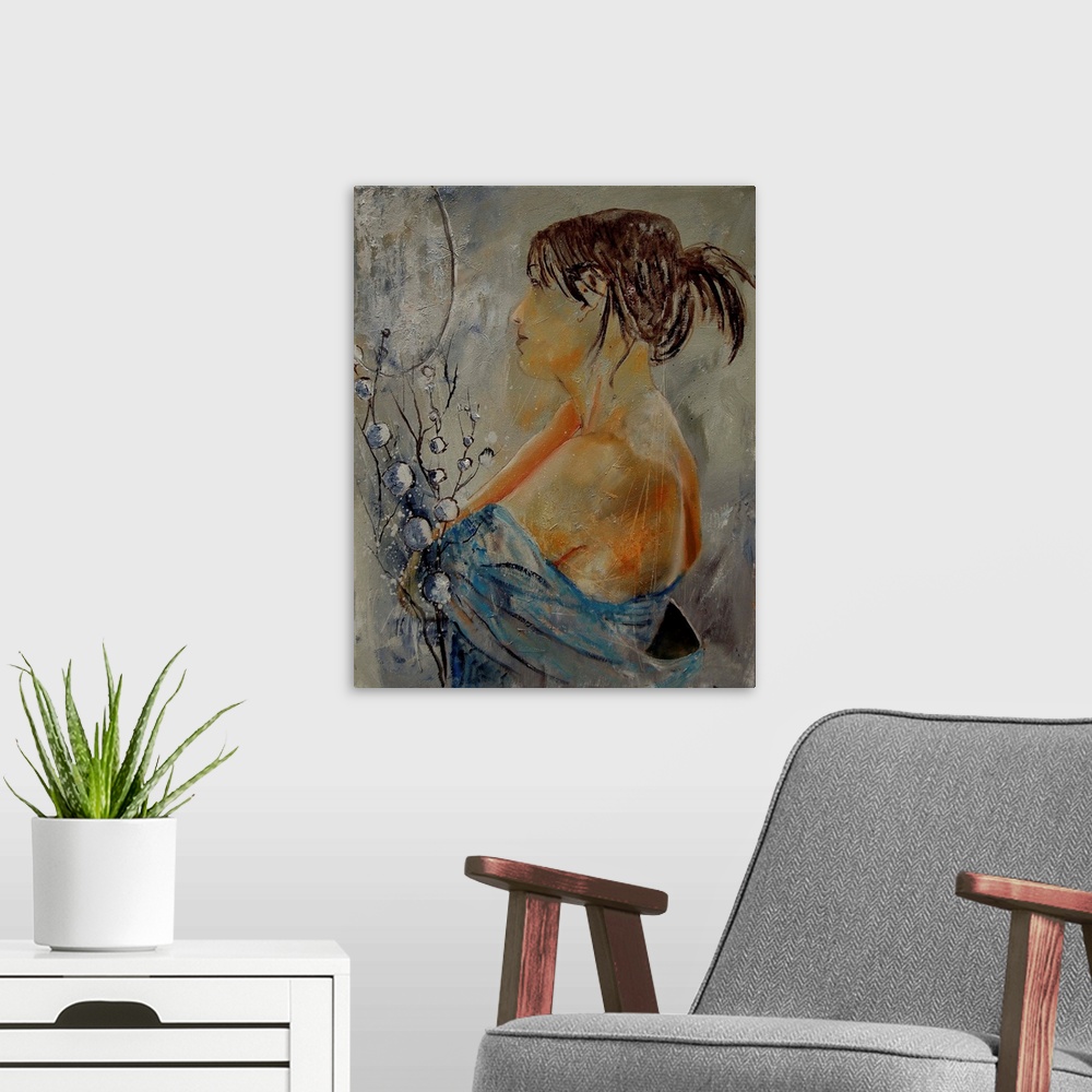 A modern room featuring A nude painting of the profile of a woman in textured neutral colors.